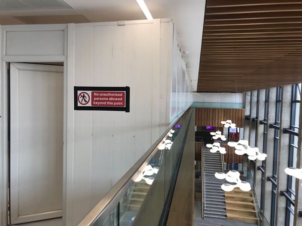 Office hoarding job completed over light section